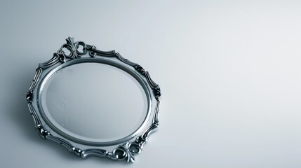 Antique silver mirror reflecting on a white background