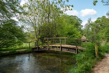 old wooden bridge over the River Test Hampshire England