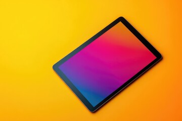 Black Tablet on Yellow Background with Gradient Screen