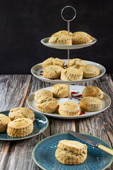 Freshly home baked scones on a cake stand