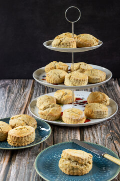 Freshly home baked scones on a cake stand