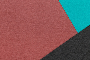 Fototapeta premium Texture craft dark red paper background with turquoise and black border. Vintage abstract maroon cardboard.