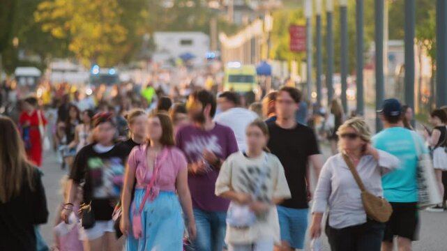 Time-lapse unrecognizable blurry huge crowd of people crossing city street, busy crossroad fast motion, many pedestrians walking crosswalk. Rush hour crowded, people walk, blurred faces and brands