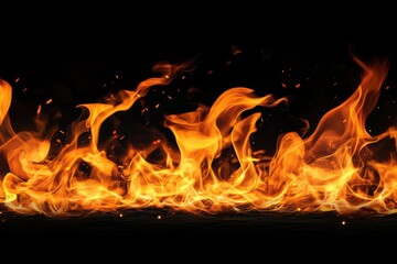 Obraz premium Fiery Flames Rising Above a Black Surface