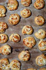 Puff pastry rolls on a baking sheet