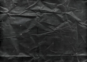 Black crumpled paper texture background