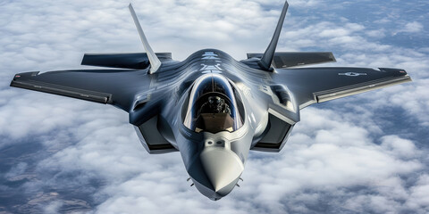Lockheed martin f-35 lightning ii flying above clouds