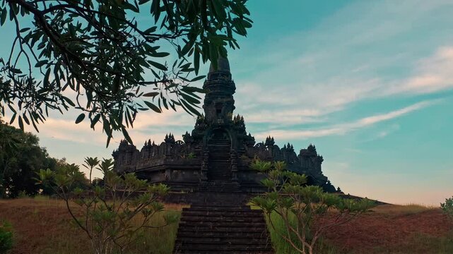Bajra Sandhi or Monumen Taman Mumbul monument to the struggle for independence in the rays of the rising sun. Bali, Indonesia. 4K Aerial view