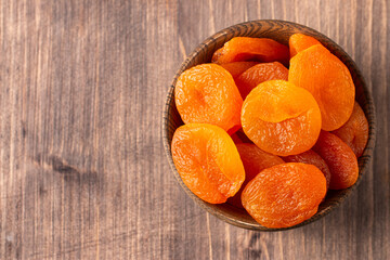 Dried apricots in a bowl. Dried fruits.  © jeny_lk