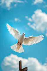 Fototapeta premium Holy spirit symbol, white dove flying over wooden cross with blue sky background