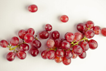 Red grape isolated on white background. Clipping path.