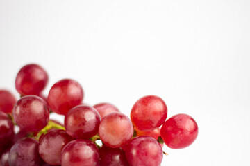 Red grape isolated on white background. Top view