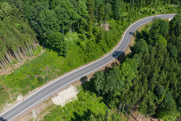 A new bridge across a small river. Summer time. Small reinforced concrete bridge after reconstruction. New asphalt.
Infrastructure construction at the final stage of. Small Reinforced Concrete Bridge 