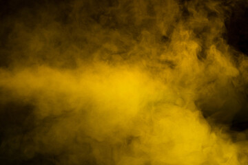 Yellow steam on a black background.