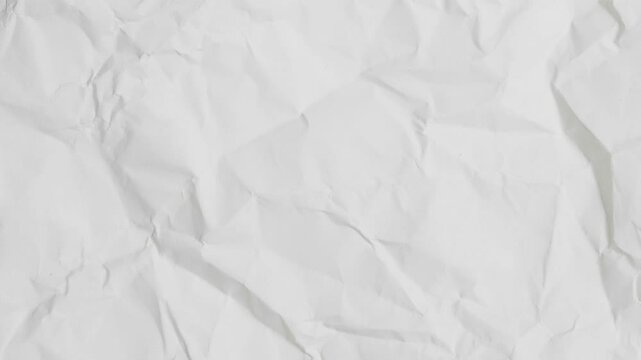 Crumpled white paper texture background animation	

