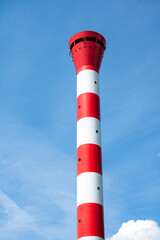 Hamburg, Germany, July 19, 2024 - Red and white ship chimney against blue sky
