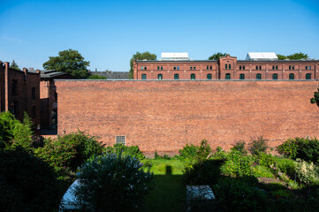 Hamburg, Germany, July 19, 2024 - Brick stone facade of multi story social housing block