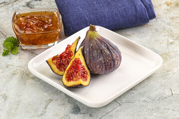 Purple ripe fig with cut