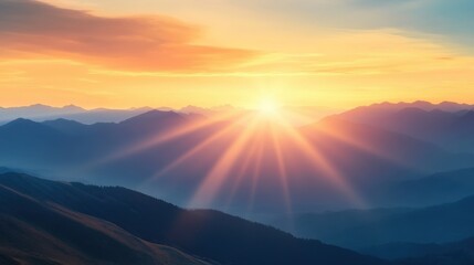 A breathtaking sunrise over a vast mountain range with warm, glowing hues illuminating the sky and landscape.