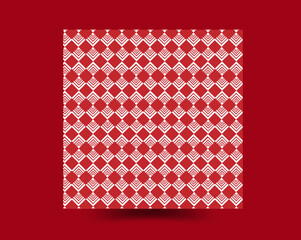 White pattern on a red background
