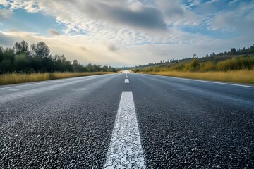 Naklejka premium Asphalt highway road and grassland highway natural landscape under blue sky.