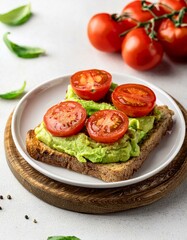 Vegan sandwich with avocado and tomatoes. Diet food. Copy Space