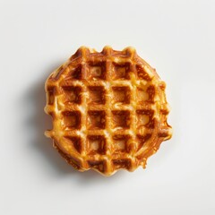 A golden brown waffle with a crispy exterior and soft, fluffy interior, isolated on a white background.
