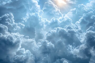 Fototapeta premium Serene Sky: A Majestic View of Fluffy Clouds Illuminated by Sunlight