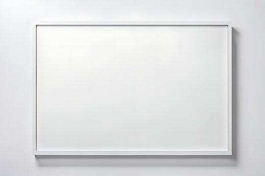 Empty white frame isolated on white background. Lay mockup for design and print. Copy space. Minimalist art concept