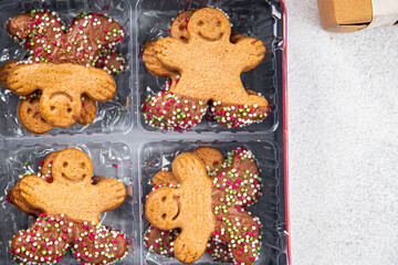 gingerbread man Christmas cookies sweet gingerbread baked christmas background New Year holiday fresh meal food snack on the table copy space food background rustic top view