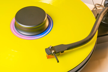 Coloured vinyl record spinning on a hifi turntable

