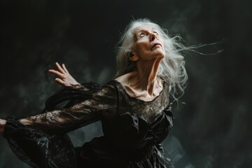 An ageing dancer with arthritis, portraying elegant movements that tell story of grace in the face of adversity