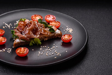 Variation of several toasts or bruschetta with prosciutto, mushrooms and veal