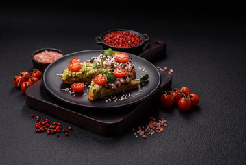 Crispy sandwich or bruschetta with guacamole, tuna and flax seeds