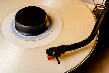 Coloured vinyl record spinning on a hifi turntable
