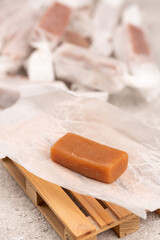 Handmade toffee, creamy taste, close-up