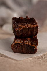 Handmade toffee, bitter chocolate with coffee beans, close-up