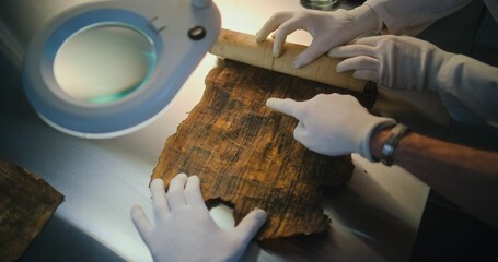 Scientists examine and discover cultural heritage of extinct human civilization. Two archaeologists...