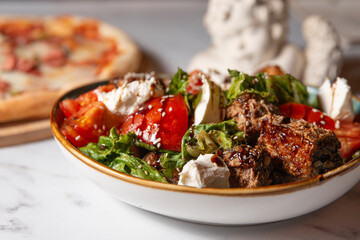 salad with meat, vegetables, cheese close up, with free space for your text, restaurant food, food banner