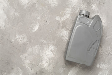 Machine oil on concrete background, top view