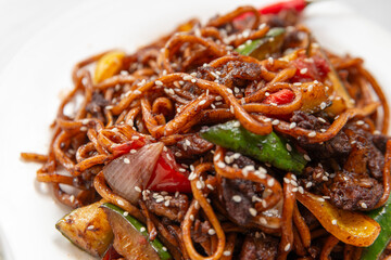 fried lagman, Lamb Stir Fry Leghman, Uzbek Laghman Traditional Noodle Dish