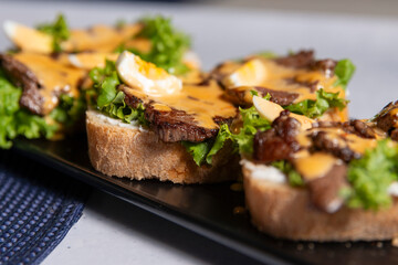 bruschetta with grilled beef salad and sauce 