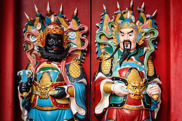 Traditional Chinese temple wooden doors in Tua Pek Kong Temple outside details in Kuching Sarawak Malaysia