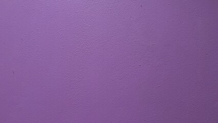 Purple plaster wall texture for background.