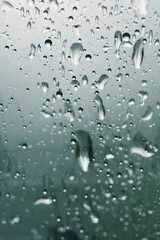 Macro, raindrops on a window pane.