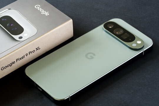 Google Pixel 9 Pro XL smartphone in Hazel Green, displayed alongside its retail box. Stafford, United Kingdom, August 22, 2024.