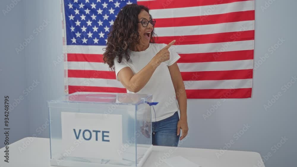 Canvas Prints hispanic middle age woman standing happily by vote ballot, pointing to the side with smiling express