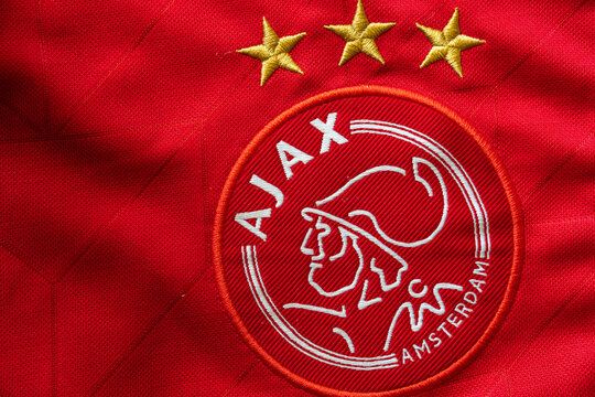AJAX team shield, Netherlands soccer team badge on a red background
