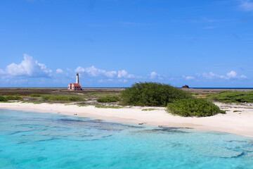 Lighthouse on the shore of the sea