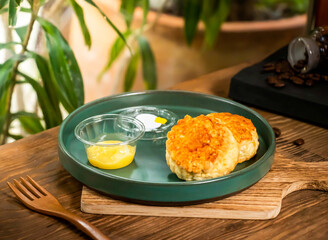 Buttery Scones with Lemon Curd served in dish isolated on table side view of taiwan food